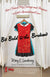 Book cover for 'Be Bold in the Broken' by Mary E. Lenaburg,  featuring a red dress displayed in a dressing room with white curtains.